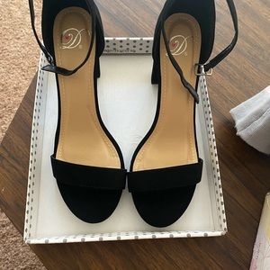 Size 10 black heels. Never worn before